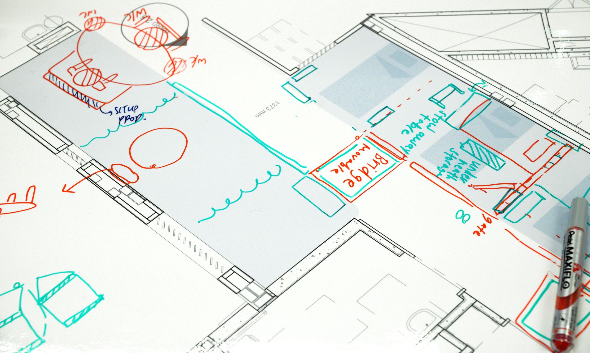 The ward plan marked up by hand in red and teal during a co-creation session